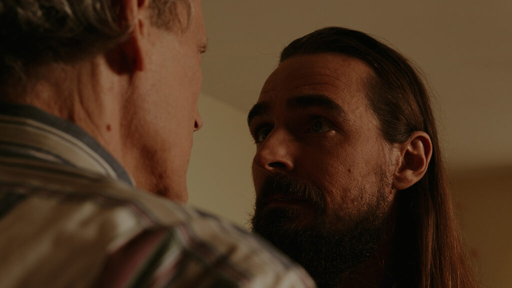 film still of Jacob A. Ware playing the Whistleblower in "Disclosure"